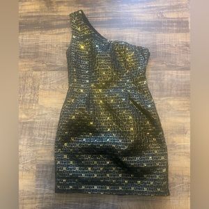 Brand is XXI Size Medium Gold and Black